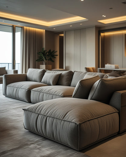 Modern living room with a large gray sofa Dubai
